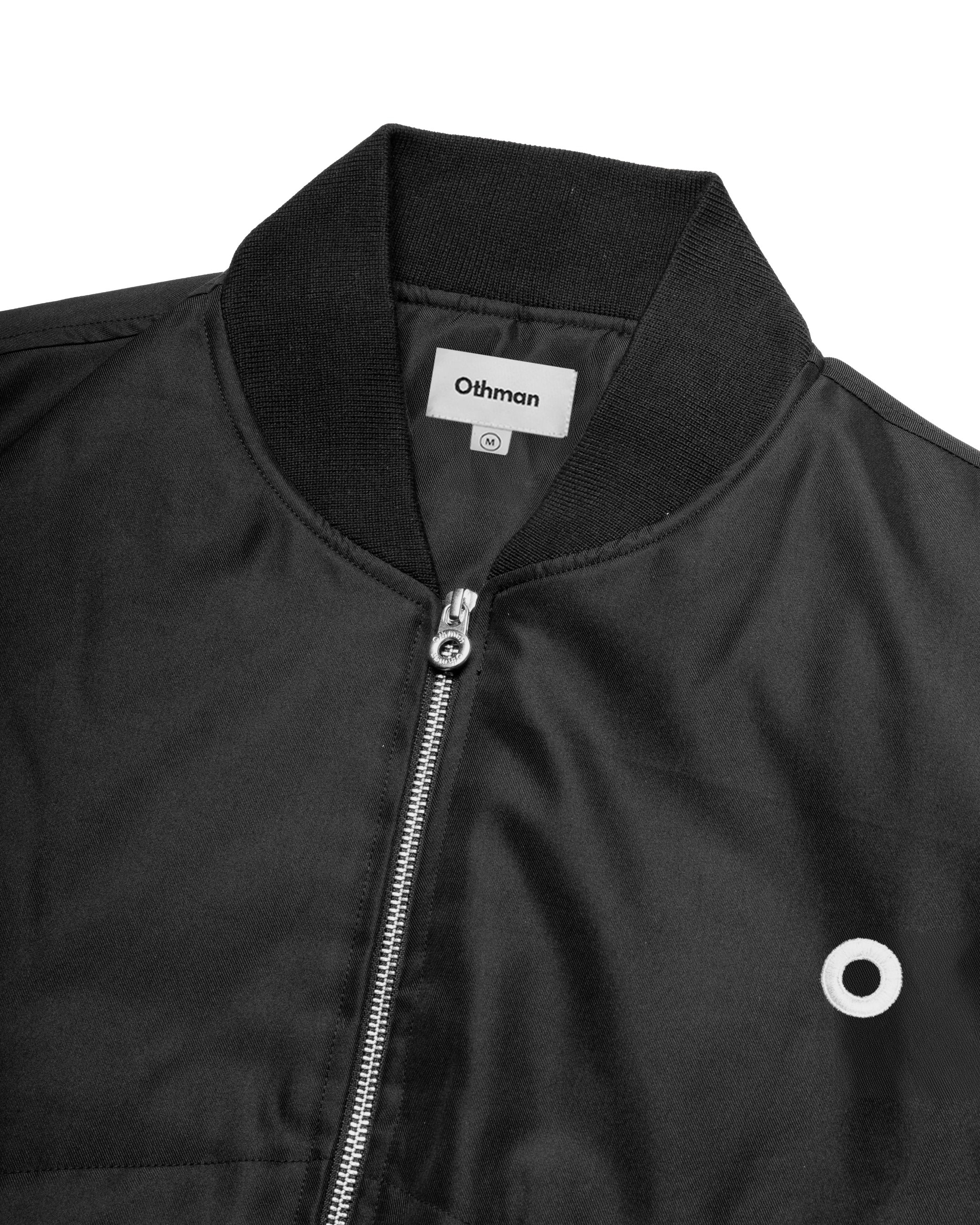 OTHMAN — ribbed collar and zip, close